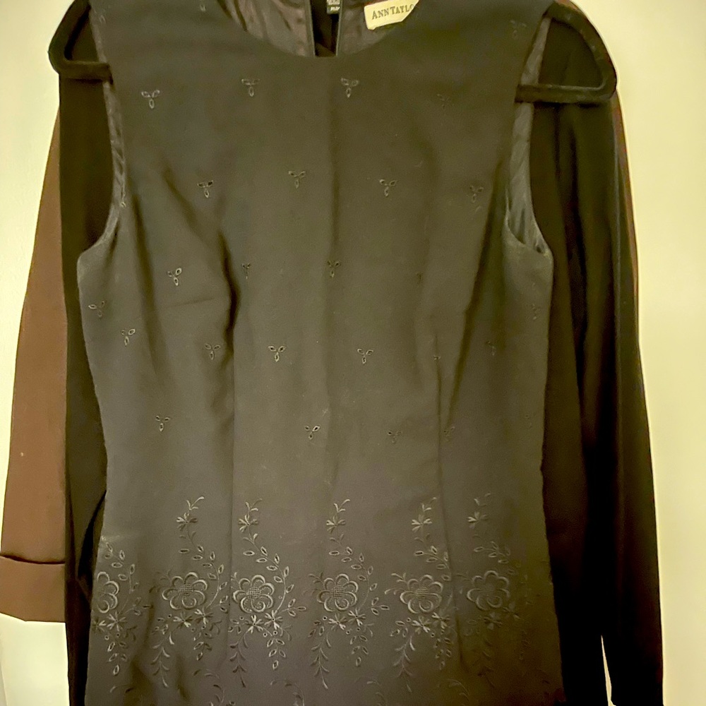 Slip into this gorgeous Ann Taylor LBD with intricate design on the waist.